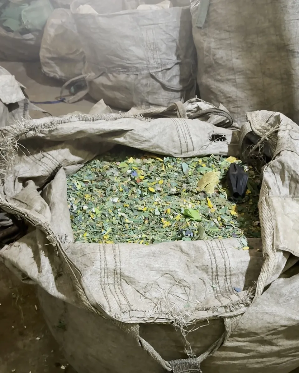 Sack of shredded plastic before washing at Luther Plastics